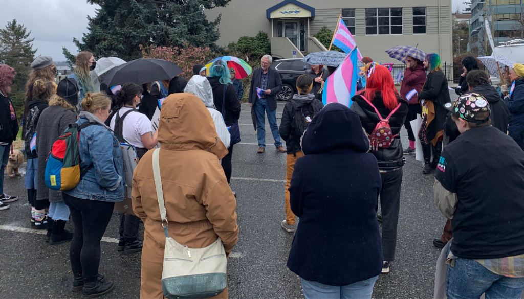 Large group of people gathered outside to mark International Transgender Day of Visibility - Vancouver Island.